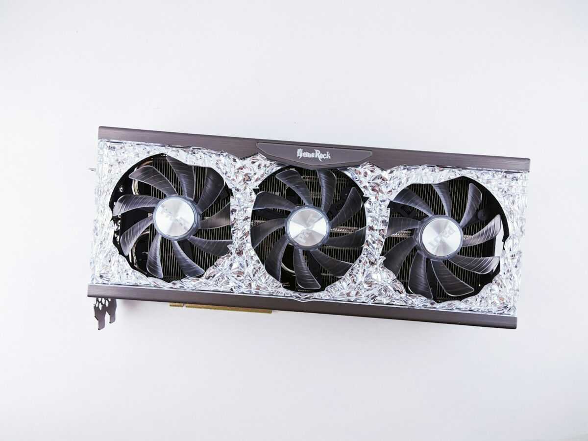 a close up of a computer fan on a wall